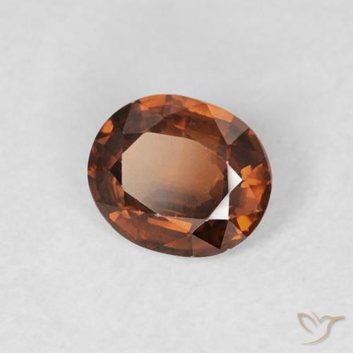 Circón Naranja medio natural de 0.83 ct, Ovalada, VS