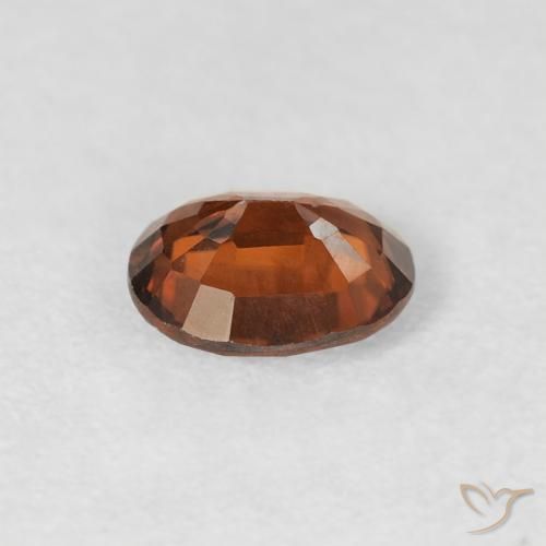 Circón Naranja medio natural de 0.83 ct, Ovalada, VS