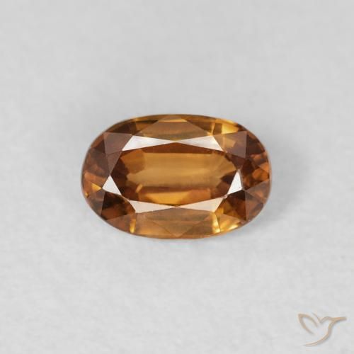 0.70ct Natural Naranja marrón Circón, Ovalada, VVS-VS