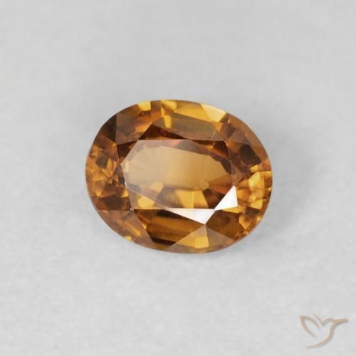Circón Marrón naranja natural de 0.85 ct, Ovalada, VVS-VS