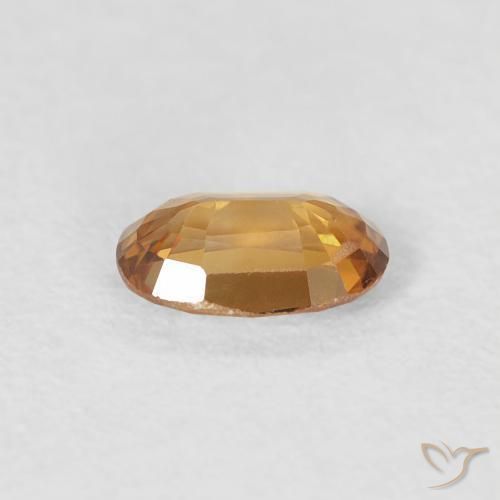 Circón Naranja medio natural de 0.70 ct, Ovalada, VVS-VS