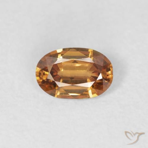 0.60ct Natural Naranja medio Circón, Ovalada, VVS-VS